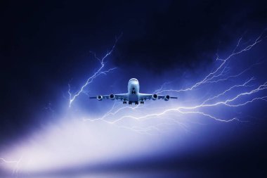 Lightning strike in a thunderstorm near the plane