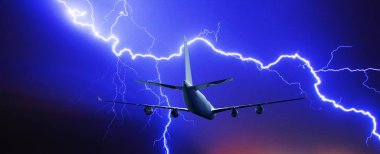 Lightning strike in a thunderstorm near the plane
