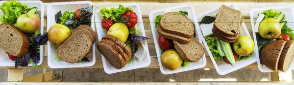 Tomatoes Cucumbers Various Greens Fruits Cheese Bread White Plastic Plates — Stock Photo, Image