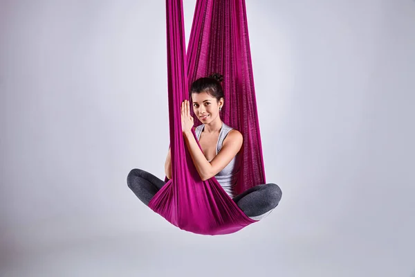 Aerial different inversion antigravity yoga in a hammock — Stock Photo, Image