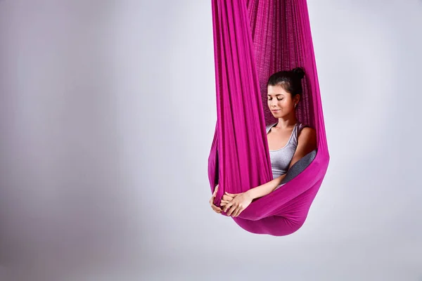 Aerial different inversion antigravity yoga in a hammock — Stock Photo, Image