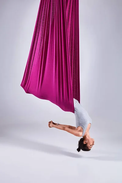 Aerial different inversion antigravity yoga in a hammock — Stock Photo, Image