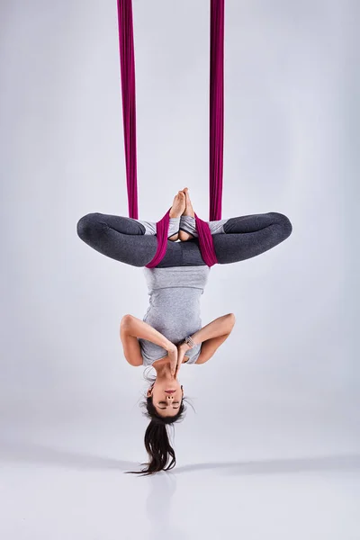 Aerial different inversion antigravity yoga in a hammock — Stock Photo, Image