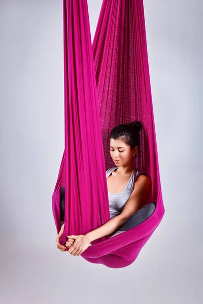 Aerial different inversion antigravity yoga in a hammock — Stock Photo, Image