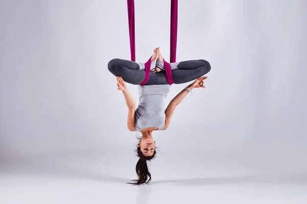 Aerial different inversion antigravity yoga in a hammock — Stock Photo, Image