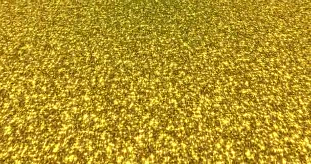 Золотой глиттер пыльный фон для фестиваля, вечеринки, мероприятия. Золотой гламур текстура Петля 4k анимации . — стоковое видео