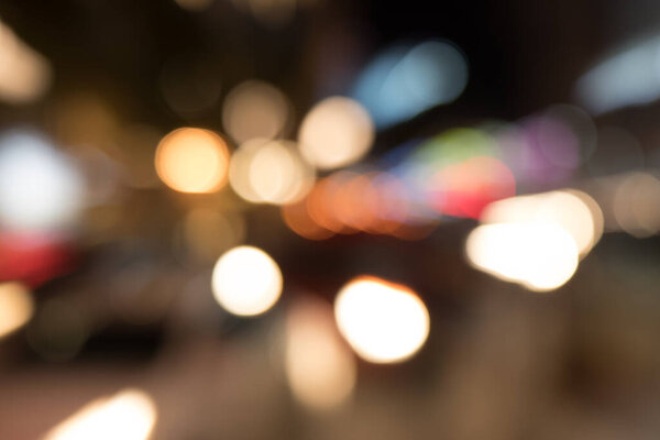 Abstract defocused city street scene at night