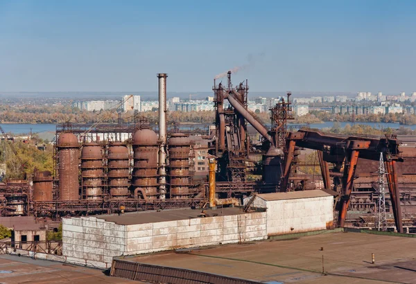 Industrial landscape with metallurgical plant. City in the background — Stock Photo, Image