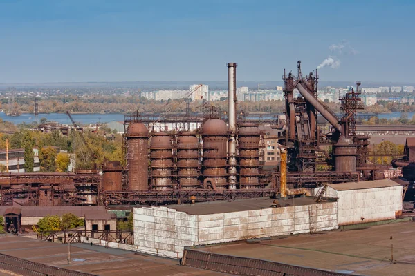 Industrial landscape with metallurgical plant. City in the background — Stock Photo, Image