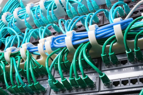 Server rack with green cables — Stock Photo, Image