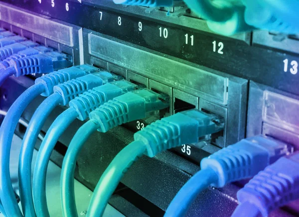 Server rack with blue cables — Stock Photo, Image