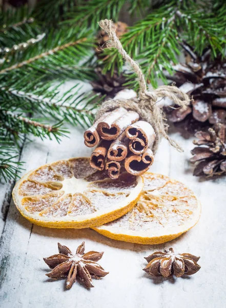 Christmas composition with anise stars, pine cones and dried orange — Stock Photo, Image