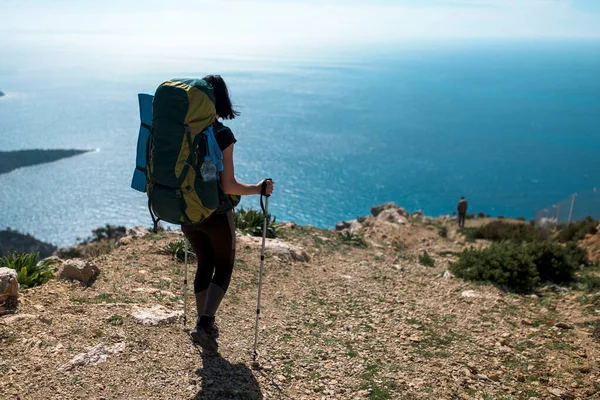 tourist in the mountains, panoramic landscape of the Turkish mountains and the sea