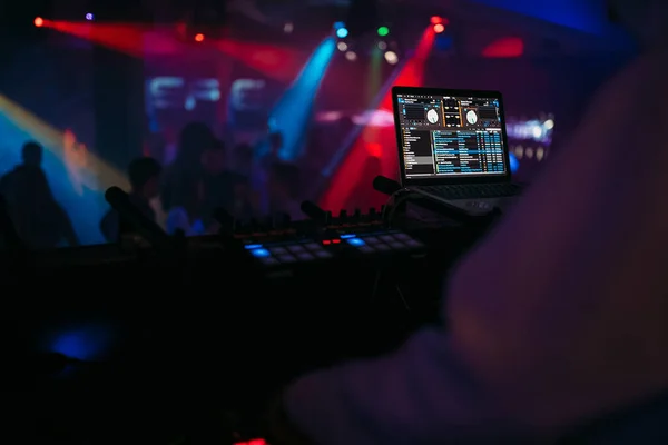 DJ plays music in the club