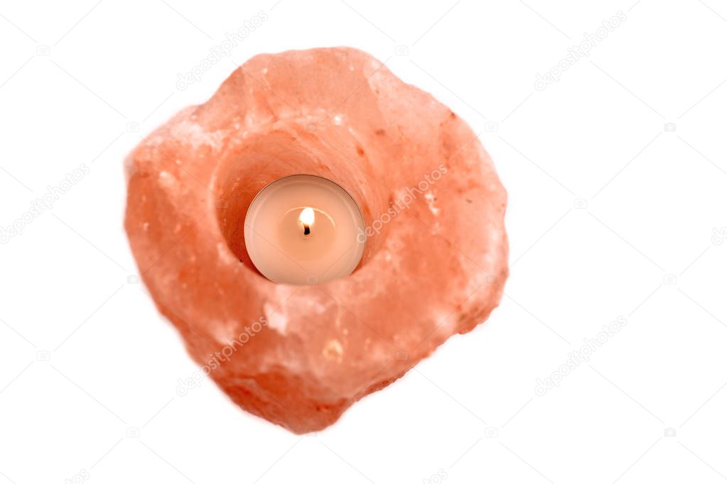 Salt lamp stock images. Salt lamp on a white background. Classic himalayan salt rock crystal lamp