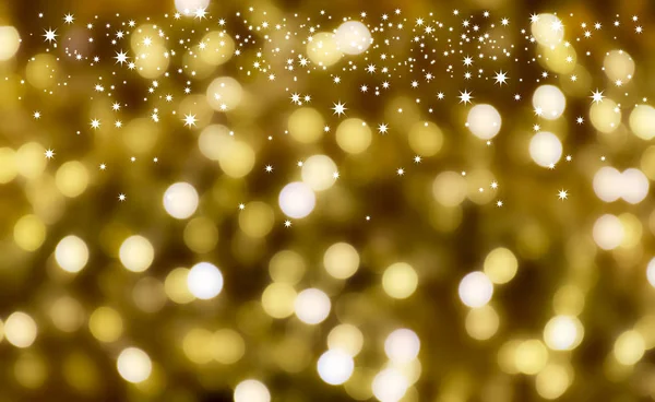Starry golden christmas background with blur effect — Stock Photo, Image