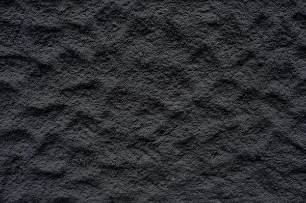 Textura černý reliéfní vypouklé zdi — Stock fotografie