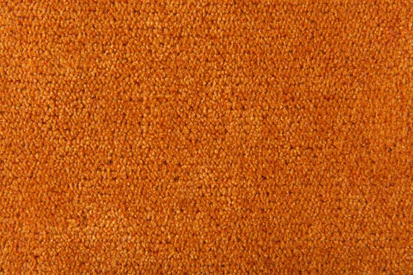 织物纹理橙色地毯为背景的 — 图库照片