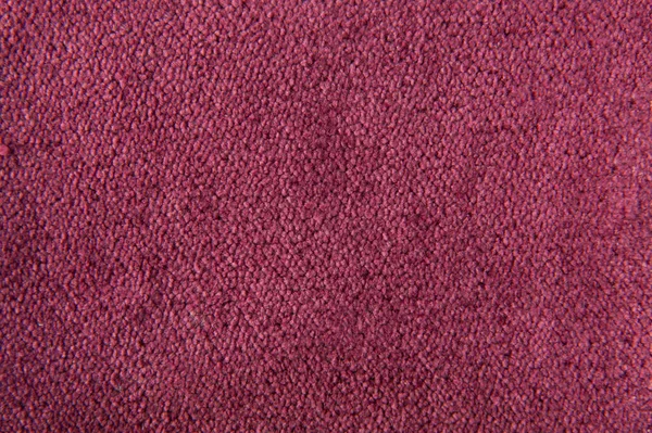 Fabric texture magenta carpeting for background — Stock Photo, Image