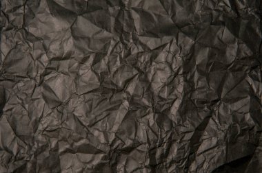 Arkaplan için buruşmuş siyah kağıt dokusu