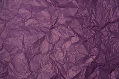 Arkaplan için buruşmuş mor kağıt dokusu