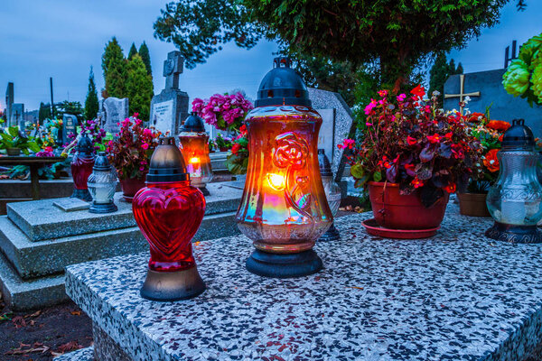 Graves on catholic cemetery. All Saints Day / All Hallows / 1st November.