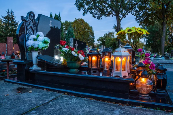 Candles Burning At a Cemetery