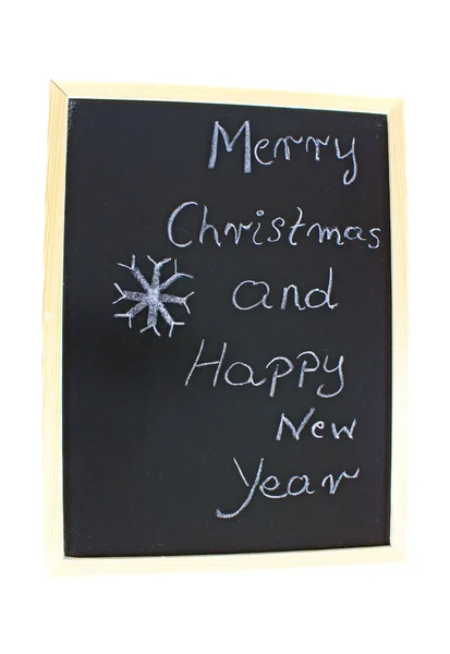 Merry Christmas and Happy New Year Education concept on school desk board