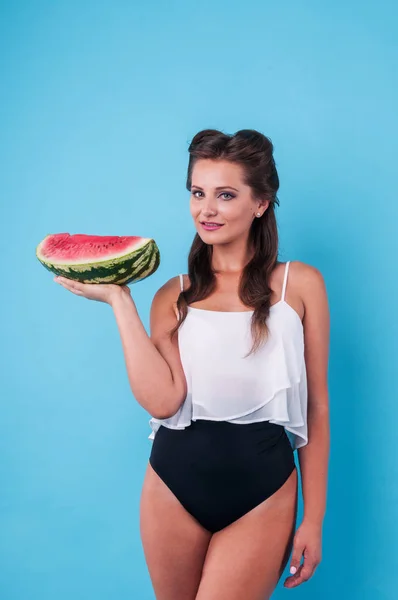 Picture of young woman holding a big slice watermelon — Stock Photo, Image