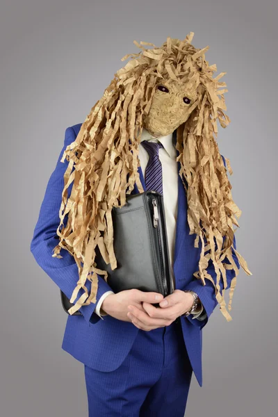 Hombre en un traje de negocios y con una máscara — Foto de Stock
