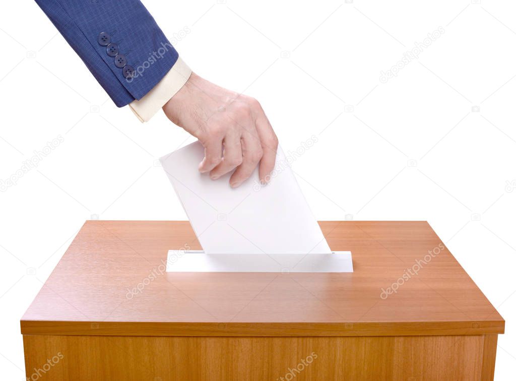 Man throws ballots into a ballot box