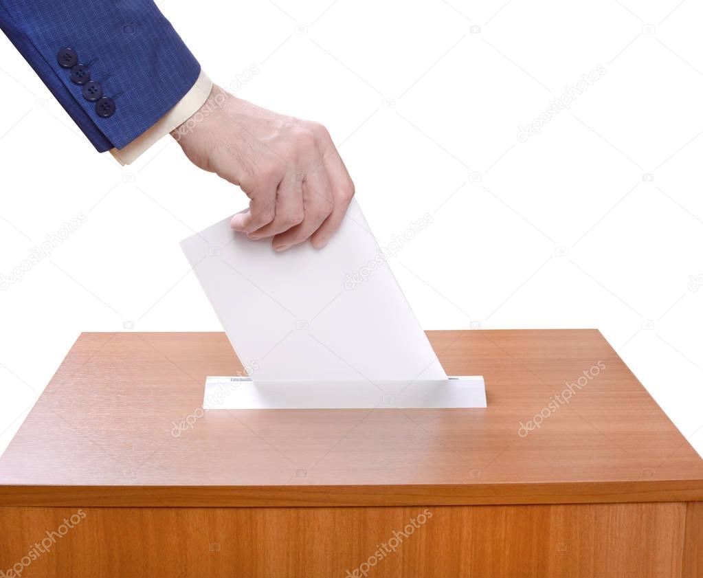 Man throws ballots into a ballot box