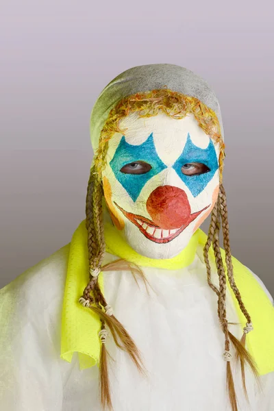 Scary clown on a gray background — Stock Photo, Image