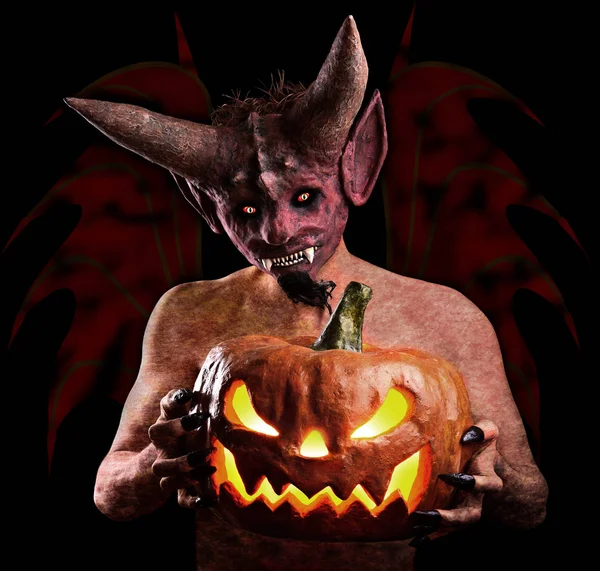 Abóbora Halloween nas mãos do diabo — Fotografia de Stock