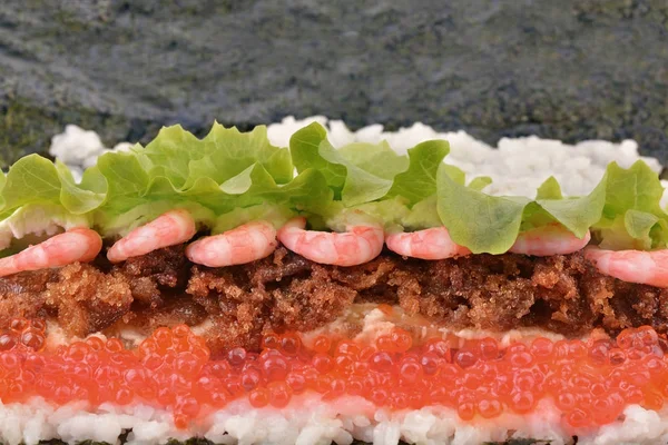 Sushi is under preparation. Japanese cuisine — Stock Photo, Image