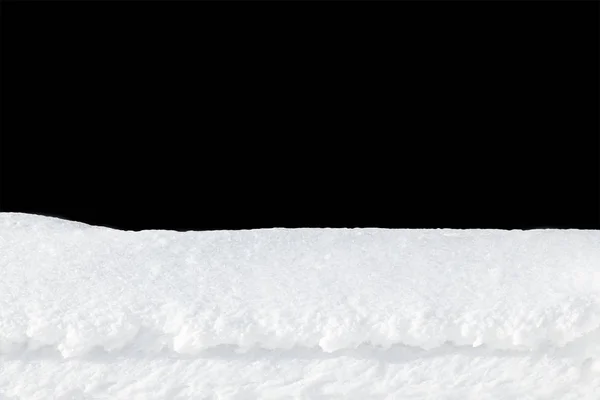 Στρώμα φρέσκου χιονιού σε μαύρο φόντο — Φωτογραφία Αρχείου