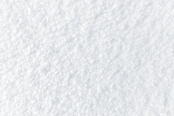 Neuschnee Hintergrund mit kleinen Schneeflocken Textur — Stockfoto