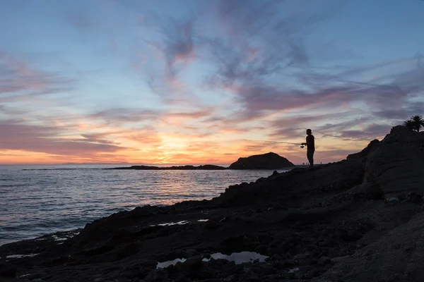 日没時の漁師のシルエット — ストック写真