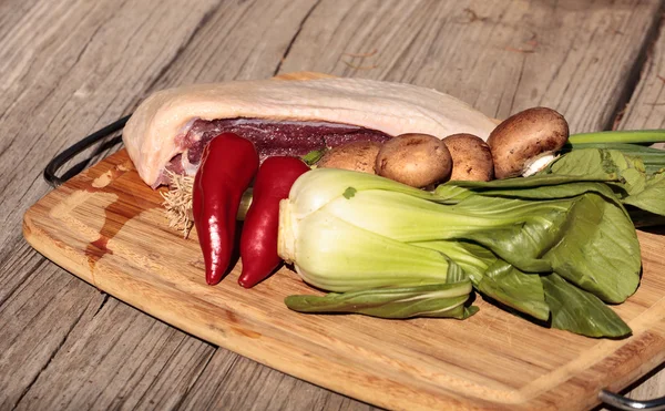 Natural raw duck breast with organic veggies — Stock Photo, Image