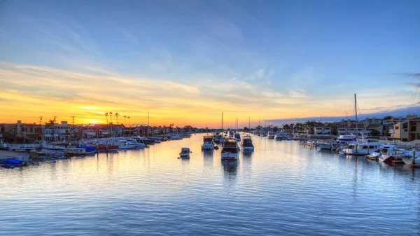 Balboa Island harbor naplementekor — Stock Fotó