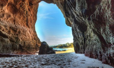 Open cave at One Thousand Steps Beach  clipart