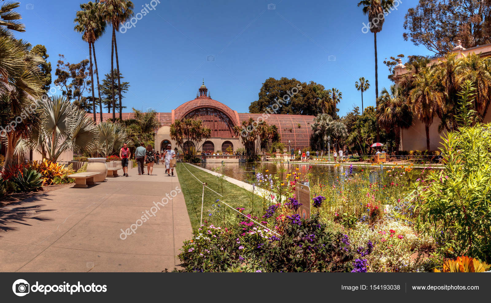 Beautiful Botanical Garden Building With Pond In Front At The Ba