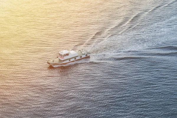 Speed boat on the sea at sunset time. — Stock Photo, Image