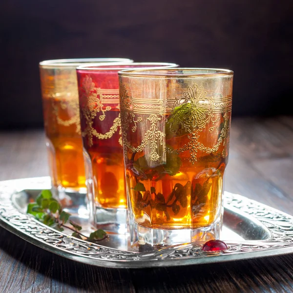 Moroccan mint tea in the traditional glasses — Stock Photo, Image