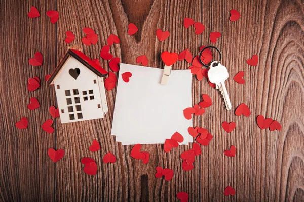 Valentine\'s day background with love letters, keys and heart shapes. New house. View from above