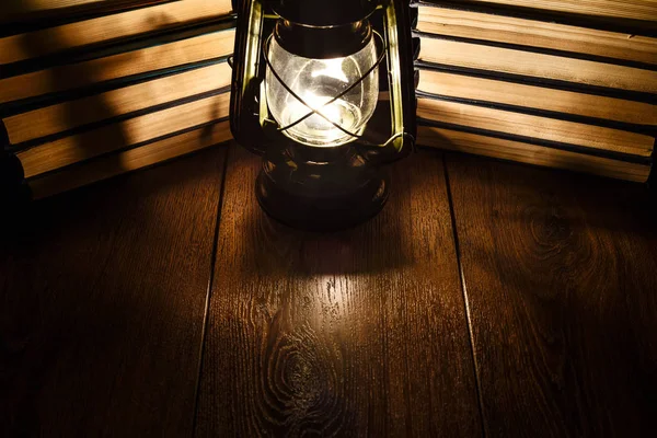 The Light Of Kerosene Lamp And Books On The Table Stock Images Page Everypixel