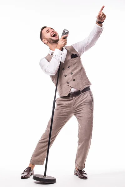 Portrait young showman in suit singing — Stock Photo, Image