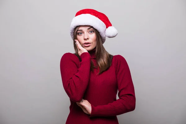 Känslomässiga jul kvinna med santa hatt — Stockfoto