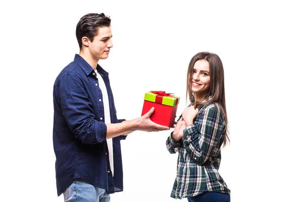 Young couple share gift on white background. Girl get present from her boufriend. — Stock Photo, Image