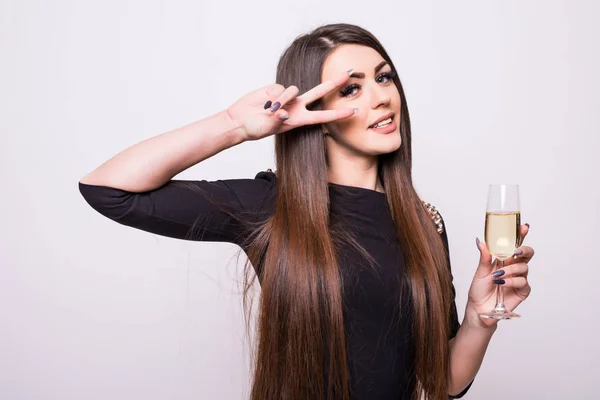 Rapariga de vestido preto beber champanhe — Fotografia de Stock